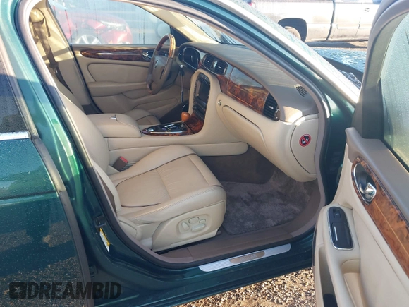 2007 Jaguar XJ VDP with VIN SAJWA82C37TH14330, listed as a IAAI auction lot 41316658 with 59,745 mi miles. Bid and sale history available at carsss.com. Image 5.
