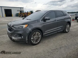 2020 Ford Edge Titanium с VIN 2FMPK3K9XLBB03754, выставлен на аукционе Copart как лот 59228775 с пробегом 63 034 миль миль и Списание • Salvage title. История ставок и продаж доступна на DreamBid. Изображение 1.