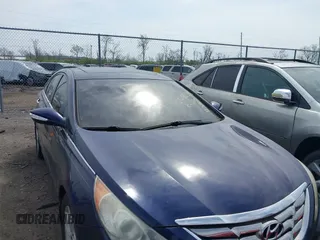 2011 Hyundai Sonata SE with VIN 5NPEC4AC6BH157681, listed as a IAAI auction lot 42035345 with 106,651 mi miles. Bid and sale history available at carsss.com. Image 6.