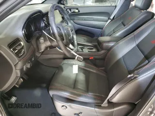 2025 Dodge Durango GT Plus with VIN 1C4RDJDG5SC506983, listed as a Copart auction lot 82427384 with 1,404 mi miles and Salvage title. Bid and sale history available at DreamBid. Image 7.
