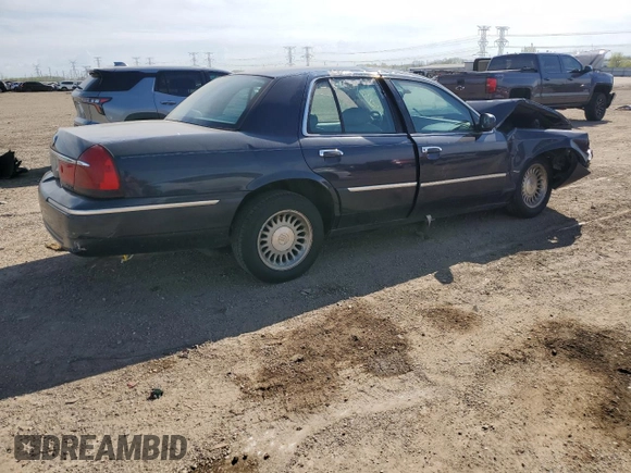 1999 Mercury Grand Marquis LS z VIN 2MEFM75W1XX635839, wystawiony jako Copart lot #55860735 z przebiegiem 114 963 mil mil oraz Szkoda całkowita • Salvage title. Historia ofert i sprzedaży dostępna na DreamBid. Obrazek 3.