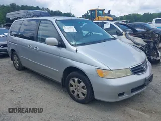 2003 Honda Odyssey EX-L with VIN 5FNRL18913B084682, listed as a IAAI auction lot 42463897 with 187,161 mi miles and . Bid and sale history available at DreamBid. Image 1.