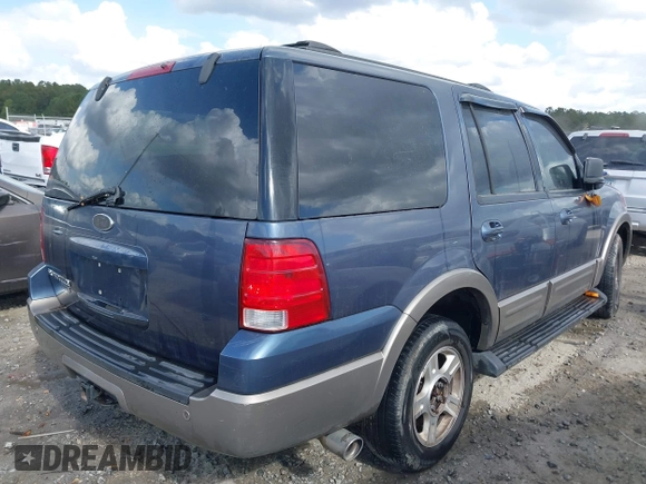 2003 Ford Expedition Eddie Bauer with VIN 1FMRU17W13LA53235, listed as a IAAI auction lot 40669736 with 317,399 mi miles. Bid and sale history available at carsss.com. Image 4.