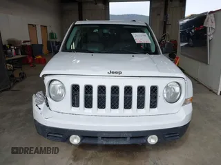 2014 Jeep Patriot Latitude with VIN 1C4NJPFA0ED680509, listed as a IAAI auction lot 41801775 with 147,418 mi miles and . Bid and sale history available at carsss.com. Image 12.