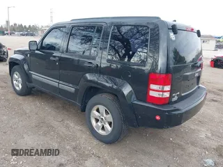 2012 Jeep Liberty Sport with VIN 1C4PJMAK8CW155559, listed as a IAAI auction lot 42131013 with 127,916 mi miles. Bid and sale history available at carsss.com. Image 3.