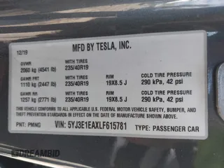 2020 Tesla Model 3 Standard Range Plus with VIN 5YJ3E1EAXLF615781, listed as a IAAI auction lot 42068935 with 96,026 mi miles. Bid and sale history available at carsss.com. Image 9.