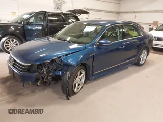 2017 Volkswagen Passat R-Line w/Comfort Pkg with VIN 1VWDT7A33HC033883, listed as a IAAI auction lot 42042563 with 410,105 mi miles. Bid and sale history available at carsss.com. Image 2.