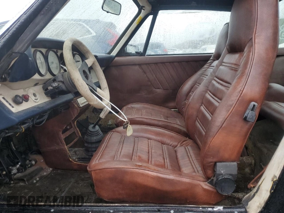 1977 Porsche 911 with VIN 9117212463, listed as a Copart auction lot 46277515 with Not provided miles and Clean title. Bid and sale history available at DreamBid. Image 7.