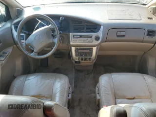 2002 Toyota Sienna LE with VIN 4T3ZF13C52U458553, listed as a Copart auction lot 77957754 with 164,058 mi miles and Salvage Title. Bid and sale history available at carsss.com. Image 8.
