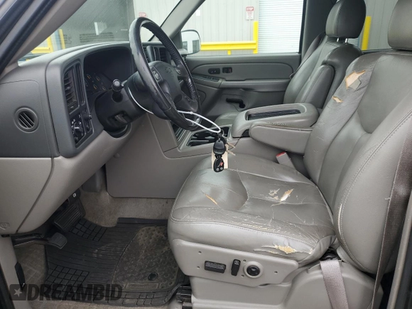 2005 Chevrolet Tahoe Z71 with VIN 1GNEC13T85R141076, listed as a Copart auction lot 54733415 with 310,992 mi miles and Salvage title. Bid and sale history available at DreamBid. Image 7.