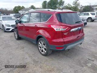 2016 Ford Escape Titanium with VIN 1FMCU9JX2GUA89716, listed as a IAAI auction lot 41899786 with 85,474 mi miles and . Bid and sale history available at DreamBid. Image 3.