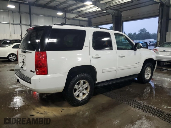 2014 GMC Yukon SLT with VIN 1GKS2CE01ER123696, listed as a Copart auction lot 63401554 with 177,174 mi miles and Salvage Title. Bid and sale history available at carsss.com. Image 3.