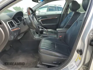 2012 Lincoln MKZ z VIN 3LNHL2GC4CR804632, wystawiony jako Copart lot #55783535 z przebiegiem 148 036 mil mil oraz Szkoda całkowita • Salvage title. Historia ofert i sprzedaży dostępna na DreamBid. Obrazek 7.