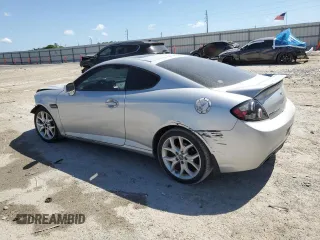 2008 Hyundai Tiburon GT z VIN KMHHN66F88U284030, wystawiony jako Copart lot #53251315 z przebiegiem Nie podano mil oraz Szkody całkowita. Historia ofert i sprzedaży dostępna na DreamBid. Obrazek 2.