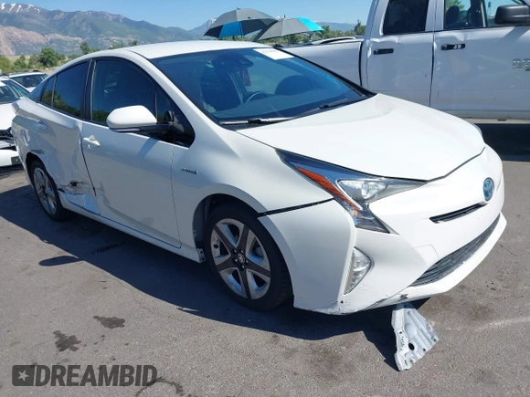 2017 Toyota Prius Two with VIN JTDKARFUXH3536565, listed as a IAAI auction lot 42374515 with 125,240 mi miles and . Bid and sale history available at DreamBid. Image 1.