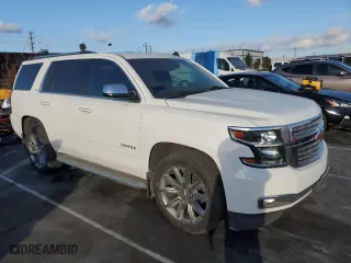 2015 Chevrolet Tahoe LTZ with VIN 1GNSCCKC3FR177176, listed as a Copart auction lot 43425335 with 116,669 mi miles and Salvage Title. Bid and sale history available at carsss.com. Image 4.