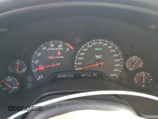 2003 Chevrolet Corvette Z06 with VIN 1G1YY12S635130087, listed as a Copart auction lot 83036504 with 80,712 mi miles and Salvage Title. Bid and sale history available at carsss.com. Image 9.