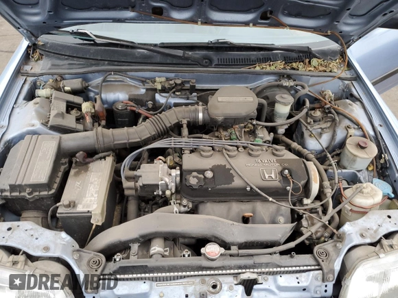 1989 Honda Civic z VIN 1HGED364XKA043135, wystawiony jako Copart lot #86406364 z przebiegiem 83 120 mil mil oraz Czysty tytuł • Clean title. Historia ofert i sprzedaży dostępna na DreamBid. Obrazek 11.