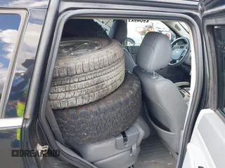2007 Jeep Grand Cherokee Limited with VIN 1J8HR58N27C594744, listed as a IAAI auction lot 41929390 with 154,140 mi miles and . Bid and sale history available at DreamBid. Image 8.