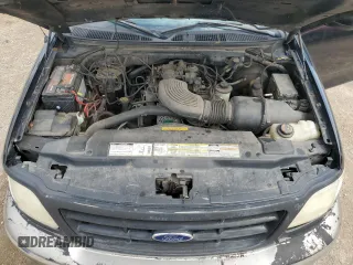 1999 Ford F-150 with VIN 1FTRX18W1XKC00918, listed as a Copart auction lot 53830305 with 205,205 mi miles and Salvage title. Bid and sale history available at DreamBid. Image 11.