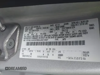 2013 Ford Escape SE with VIN 1FMCU0GX5DUA51847, listed as a IAAI auction lot 41897727 with 115,721 mi miles and . Bid and sale history available at DreamBid. Image 9.