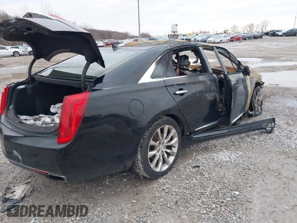 2016 Cadillac XTS Luxury Collection with VIN 2G61N5S33G9140637, listed as a IAAI auction lot 41067574 with Not Provided miles and . Bid and sale history available at DreamBid. Image 4.