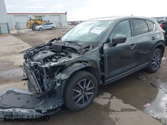 2018 Mazda CX-5 Grand Touring with VIN JM3KFBDM8J0441867, listed as a IAAI auction lot 41565147 with 62,466 mi miles. Bid and sale history available at carsss.com. Image 21.