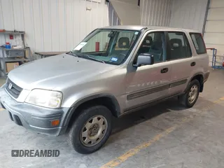 2001 Honda CR-V LX with VIN JHLRD28481S019760, listed as a IAAI auction lot 42098138 with 132,866 mi miles and . Bid and sale history available at carsss.com. Image 2.