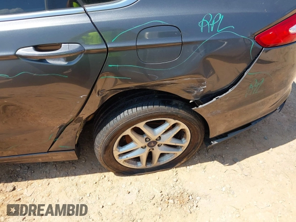 2016 Ford Fusion SE with VIN 3FA6P0HD8GR162875, listed as a IAAI auction lot 42434422 with 200,000 mi miles and . Bid and sale history available at DreamBid. Image 6.