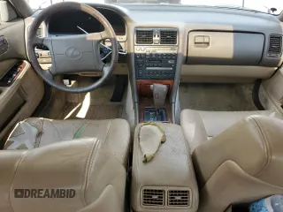 1991 Lexus LS z VIN JT8UF11E4M0077605, wystawiony jako Copart lot #73109144 z przebiegiem 146 184 mil mil oraz Szkody całkowita. Historia ofert i sprzedaży dostępna na DreamBid. Obrazek 8.