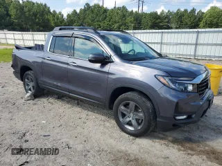 2022 Honda Ridgeline RTL-E with VIN 5FPYK3F72NB000908, listed as a Copart auction lot 65631535 with 35,796 mi miles and Salvage title. Bid and sale history available at DreamBid. Image 4.