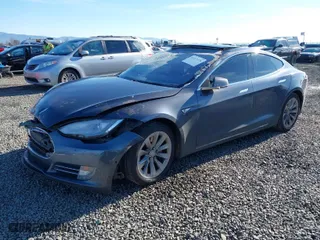 2014 Tesla Model S P85D with VIN 5YJSA1H23EFP64452, listed as a IAAI auction lot 41573176 with 155,634 mi miles. Bid and sale history available at carsss.com. Image 2.
