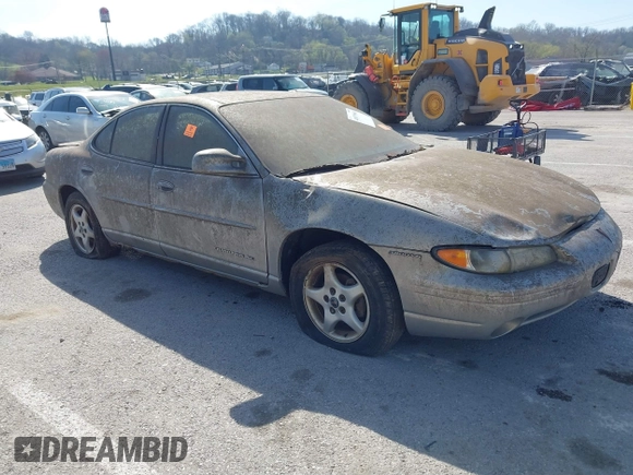 2000 Pontiac Grand Prix SE with VIN 1G2WJ52K2YF127557, listed as a IAAI auction lot 41879561 with 267,751 mi miles. Bid and sale history available at carsss.com. Image 1.