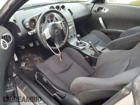 2003 Nissan 350Z with VIN JN1AZ34D53T119693, listed as a Copart auction lot 74850044 with Not Provided miles and Salvage Title. Bid and sale history available at DreamBid. Image 8.