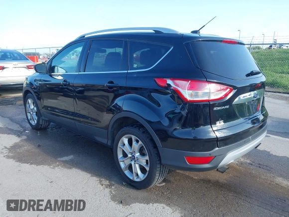 2016 Ford Escape Titanium with VIN 1FMCU9J97GUC21242, listed as a IAAI auction lot 42431567 with 96,946 mi miles and . Bid and sale history available at DreamBid. Image 3.