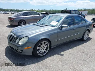 2008 Mercedes-Benz E-Class Luxury 3.5L with VIN WDBUF56X28B350102, listed as a IAAI auction lot 42033244 with 257,767 mi miles. Bid and sale history available at carsss.com. Image 2.