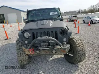 2016 Jeep Wrangler Sport with VIN 1C4AJWAG3GL223139, listed as a Copart auction lot 53782275 with 96,640 mi miles and Salvage Title. Bid and sale history available at carsss.com. Image 12.