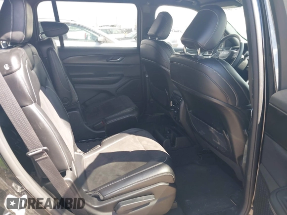 2023 Jeep Grand Cherokee Altitude with VIN 1C4RJJAG4P8817795, listed as a IAAI auction lot 42572709 with 49,468 mi miles and . Bid and sale history available at DreamBid. Image 8.