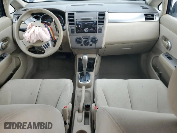2009 Nissan Versa S with VIN 3N1BC11E19L433572, listed as a Copart auction lot 54084215 with 144,178 mi miles and Salvage title. Bid and sale history available at DreamBid. Image 8.