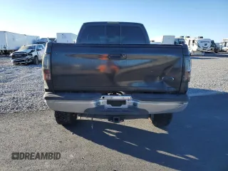 1999 Ford Super Duty F-250 XL with VIN 1FTNW21S6XEC88085, listed as a Copart auction lot 88553305 with 182,712 mi miles and Salvage Title. Bid and sale history available at carsss.com. Image 6.