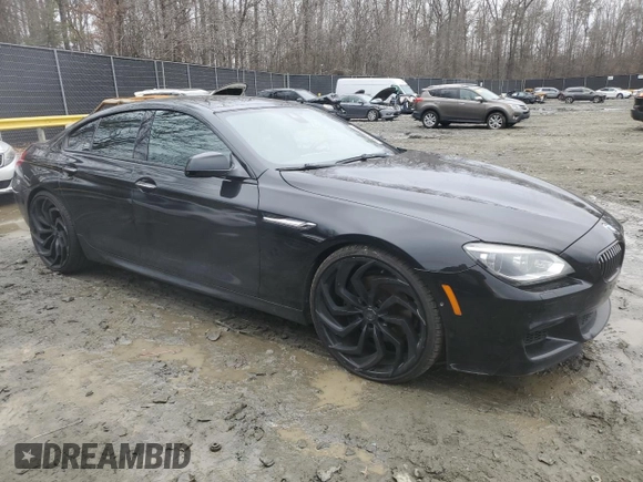 2015 BMW 6 Series 640i xDrive z VIN WBA6B8C5XFD453762, wystawiony jako Copart lot #44228965 z przebiegiem 105 188 mil mil oraz Szkoda całkowita • Salvage title. Historia ofert i sprzedaży dostępna na DreamBid. Obrazek 4.