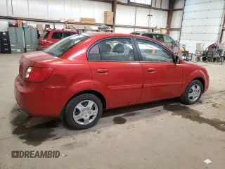 2010 Kia Rio with VIN KNADH4B39A6691792, listed as a Copart auction lot 80043064 with 161,139 mi miles and Salvage Title. Bid and sale history available at DreamBid. Image 3.