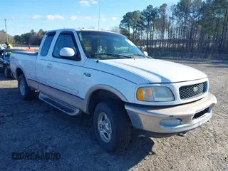 1997 Ford F-150 XL with VIN 1FTDX18W0VND35992, listed as a IAAI auction lot 41718167 with 285,973 mi miles. Bid and sale history available at carsss.com. Image 1.