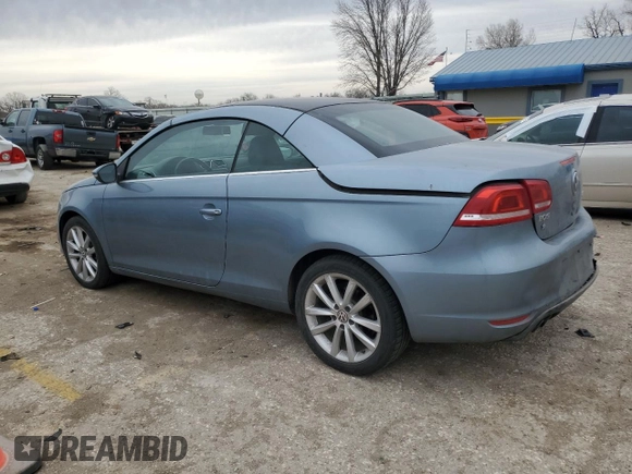 2013 Volkswagen Eos Komfort с VIN WVWBW8AH4DV001042, выставлен на аукционе Copart как лот 49492745 с пробегом 119 825 миль миль и Списание • Salvage title. История ставок и продаж доступна на DreamBid. Изображение 2.