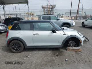 2021 MINI Hardtop Cooper with VIN WMWXR3C09M2N96671, listed as a IAAI auction lot 42031023 with 12,450 mi miles and . Bid and sale history available at DreamBid. Image 13.
