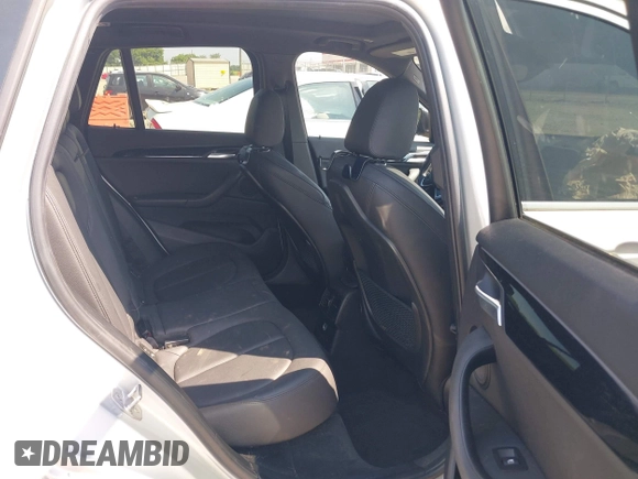 2018 BMW X1 xDrive28i with VIN WBXHT3C39J5L27926, listed as a IAAI auction lot 42582330 with 101,197 mi miles and . Bid and sale history available at DreamBid. Image 8.