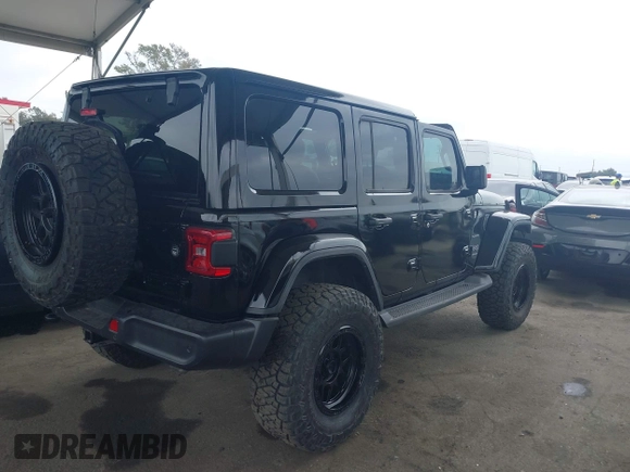 2024 Jeep Wrangler Sahara with VIN 1C4PJXEN0RW107875, listed as a IAAI auction lot 42115423 with 10,625 mi miles and . Bid and sale history available at carsss.com. Image 4.