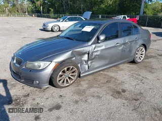 2011 BMW 3 Series 328i xDrive with VIN WBAPK7C50BA972636, listed as a IAAI auction lot 42039093 with 129,456 mi miles and . Bid and sale history available at carsss.com. Image 2.