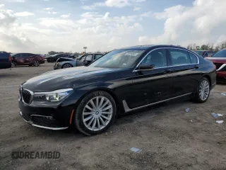 2018 BMW 7 Series 740i with VIN WBA7E2C54JG742927, listed as a Copart auction lot 70306082 with 69,735 mi miles. Bid and sale history available at carsss.com. Image 1.