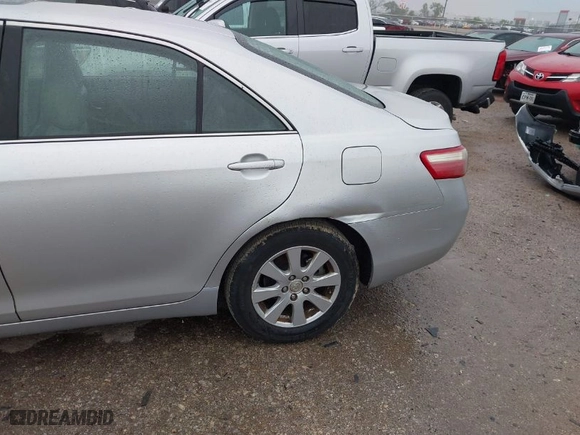 2007 Toyota Camry CE with VIN 4T1BE46K57U075558, listed as a IAAI auction lot 41948885 with 275,636 mi miles. Bid and sale history available at carsss.com. Image 6.